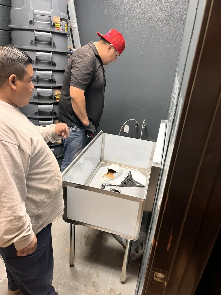Commercial plumbing and sink installation in Hamilton